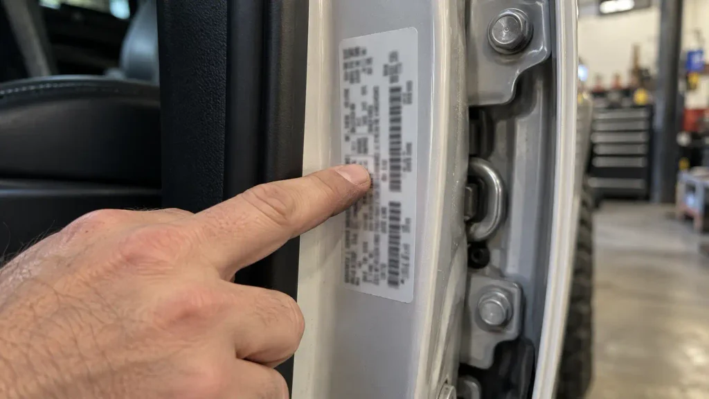 Door-jamb weight rating label on a heavy-duty pickup