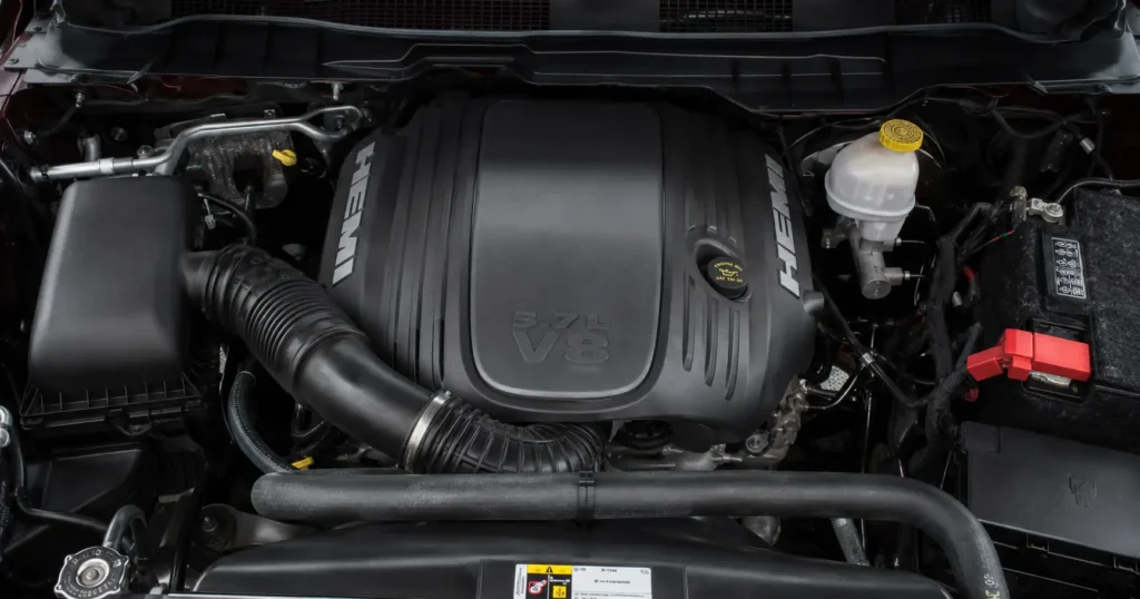 2014 Ram 1500 5.7L HEMI V8 engine bay with oil filler cap and intake visible