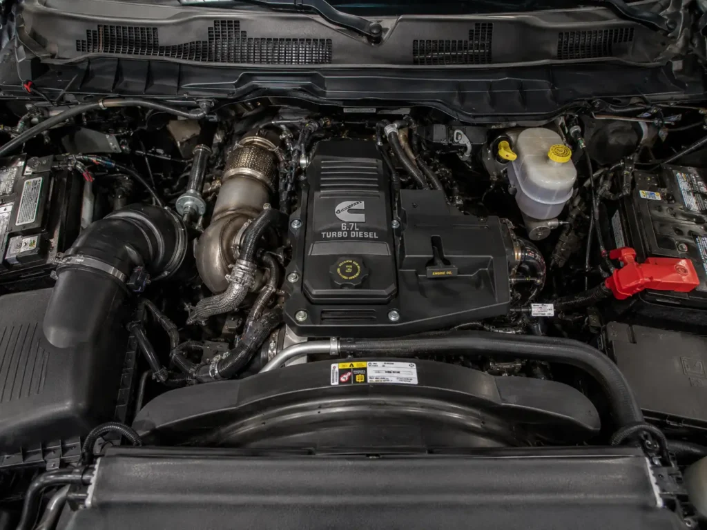 6.7L Cummins Turbo Diesel engine bay Ram 2500 showing valve cover
and turbocharger