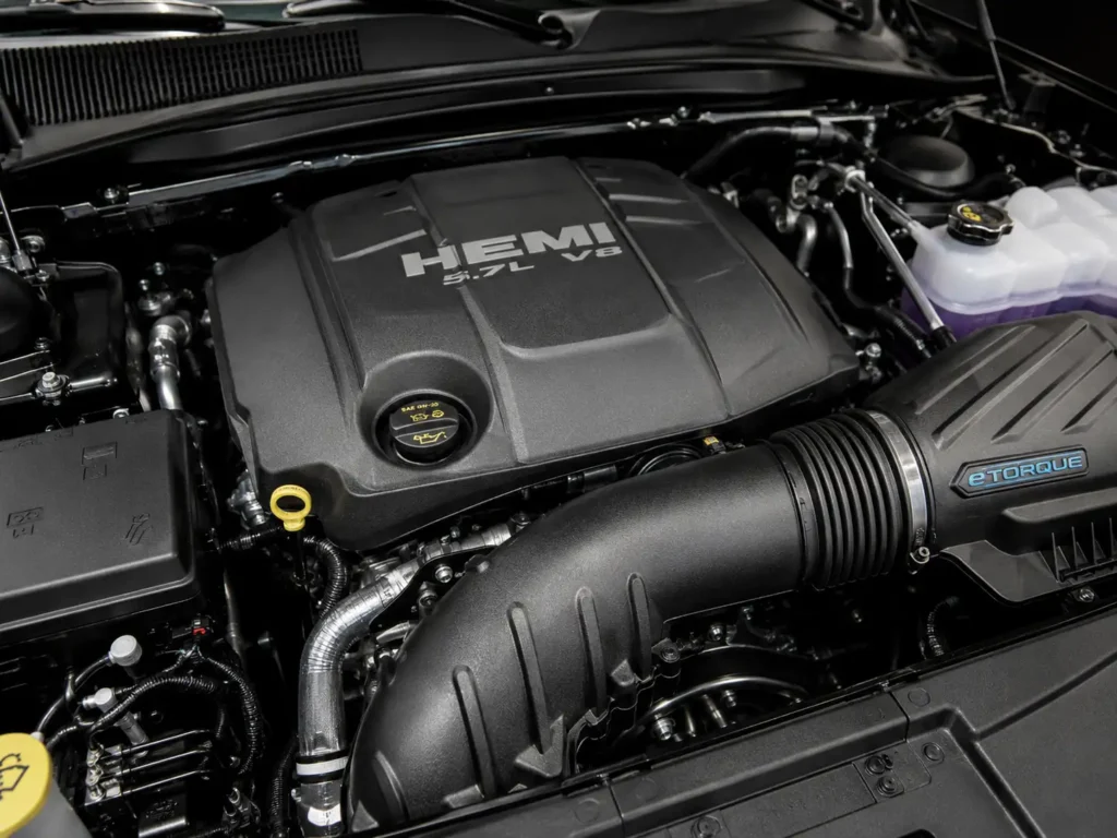 Close-up of a 2022 5.7L HEMI V8 eTorque engine bay with the hood open, showing the SAE 0W-20 oil fill cap and clean factory components.