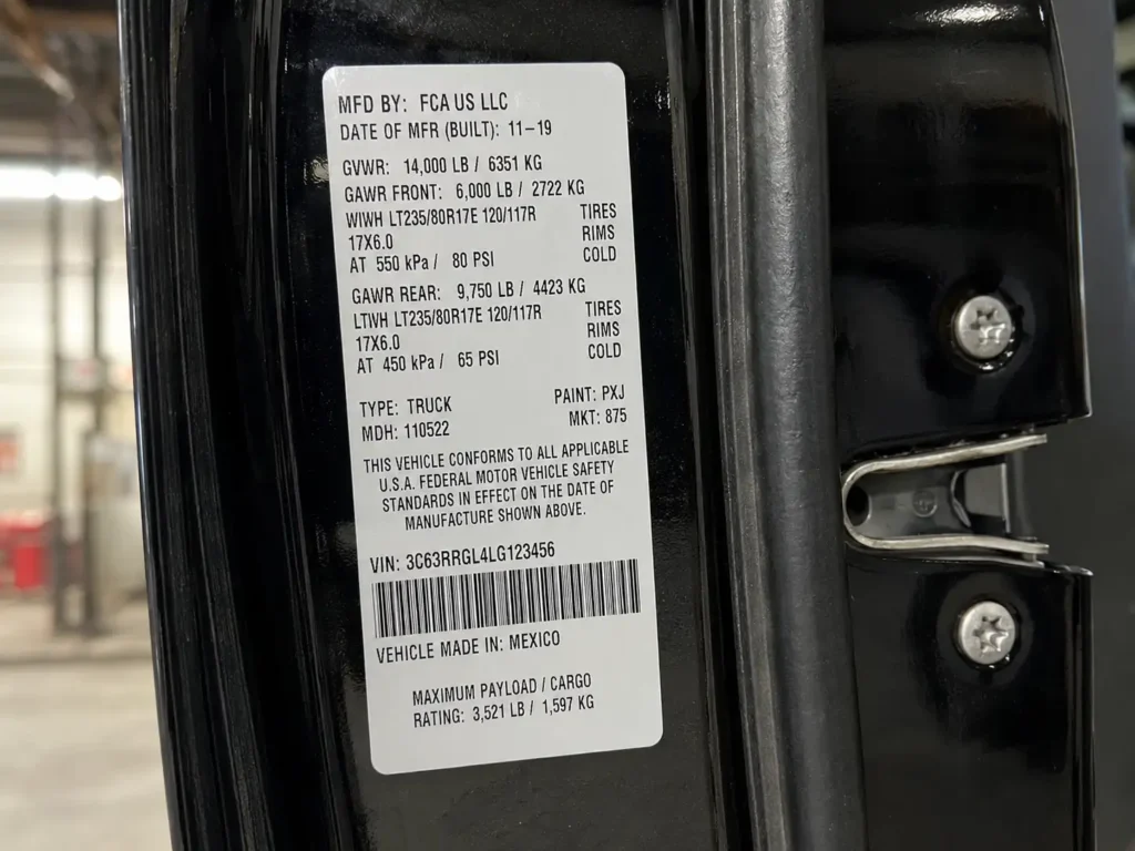 Ram 3500 door sticker showing GVWR and payload rating.