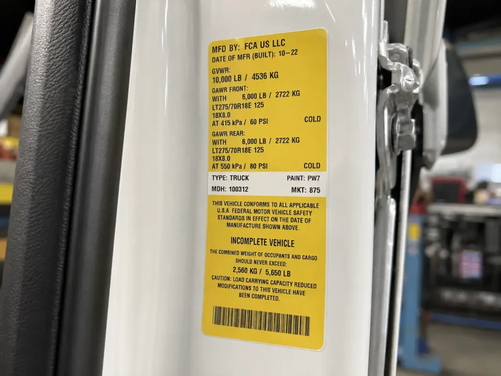 Ram 2500 door jamb towing capacity certification sticker.