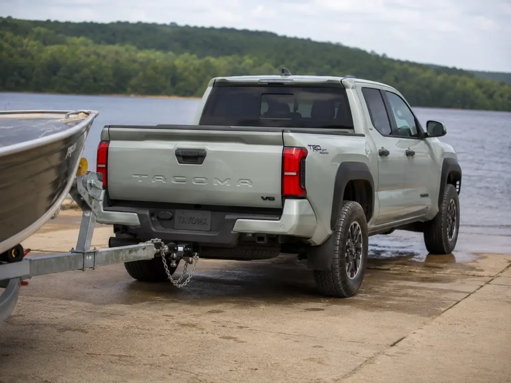 Toyota Tacoma towing capacity chart by year with boat trailer