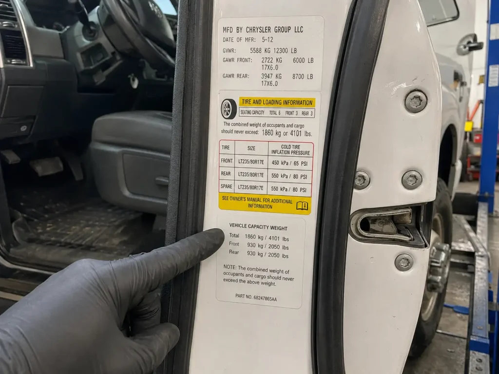 2012 Ram 3500 payload sticker showing towing capacity verification