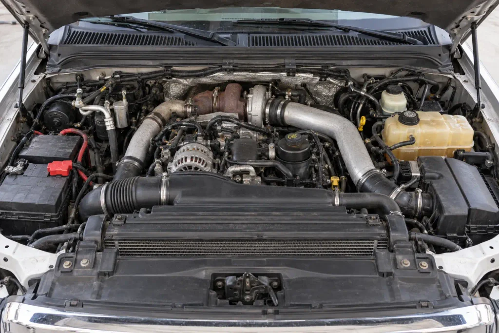 Ford 6.0 Powerstroke engine bay used for a sensor location diagram guide