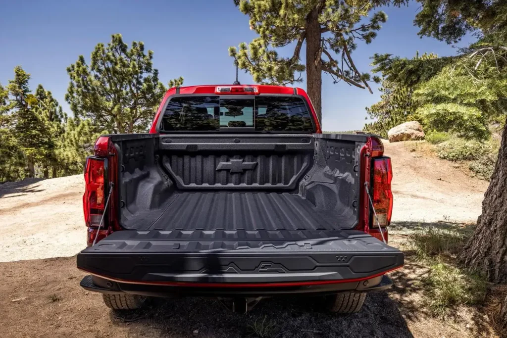 2026 Chevy Colorado Crew Cab short bed viewed from an elevated rear angle.