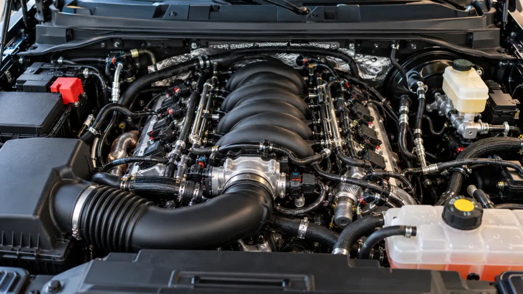 Chevrolet Silverado 5.3L Vortec V8 engine bay with intake manifold and ignition coils