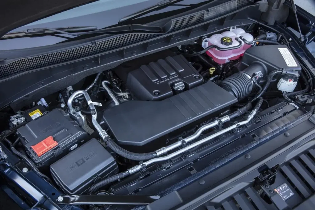 Chevy Silverado 1500 with hood open for battery fitment inspection