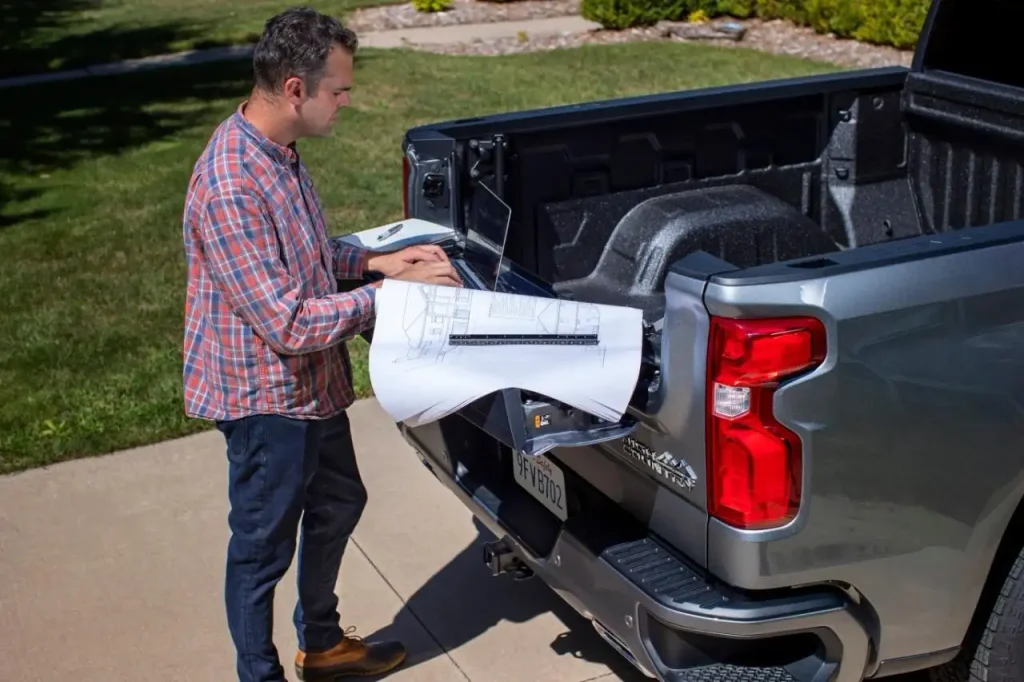 Silverado owner manual being checked to confirm the factory fuel tank capacity